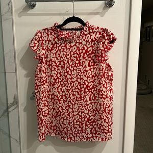 Red and white animal print top